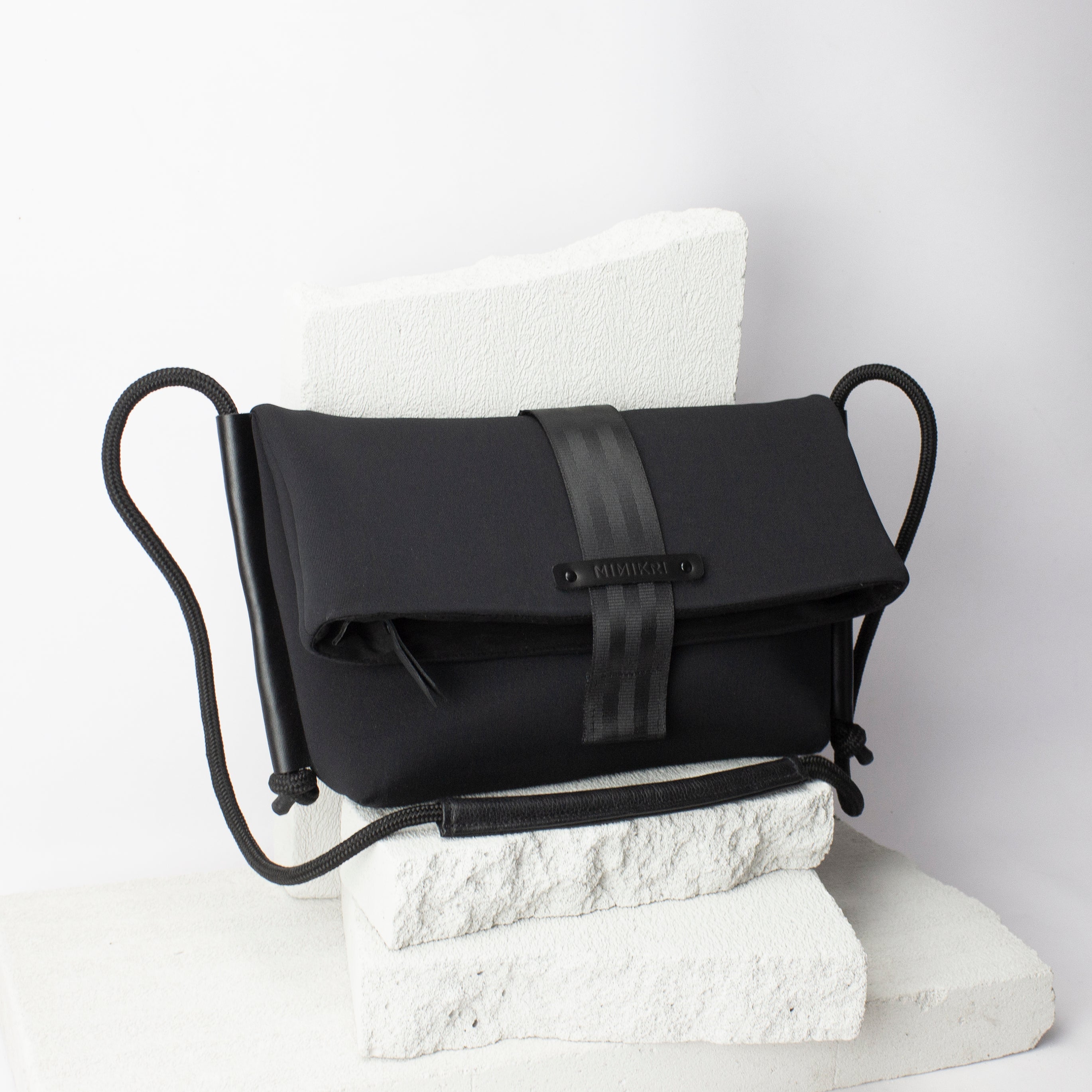 Black leather foldover shoulder everyday carry bag minimalist 