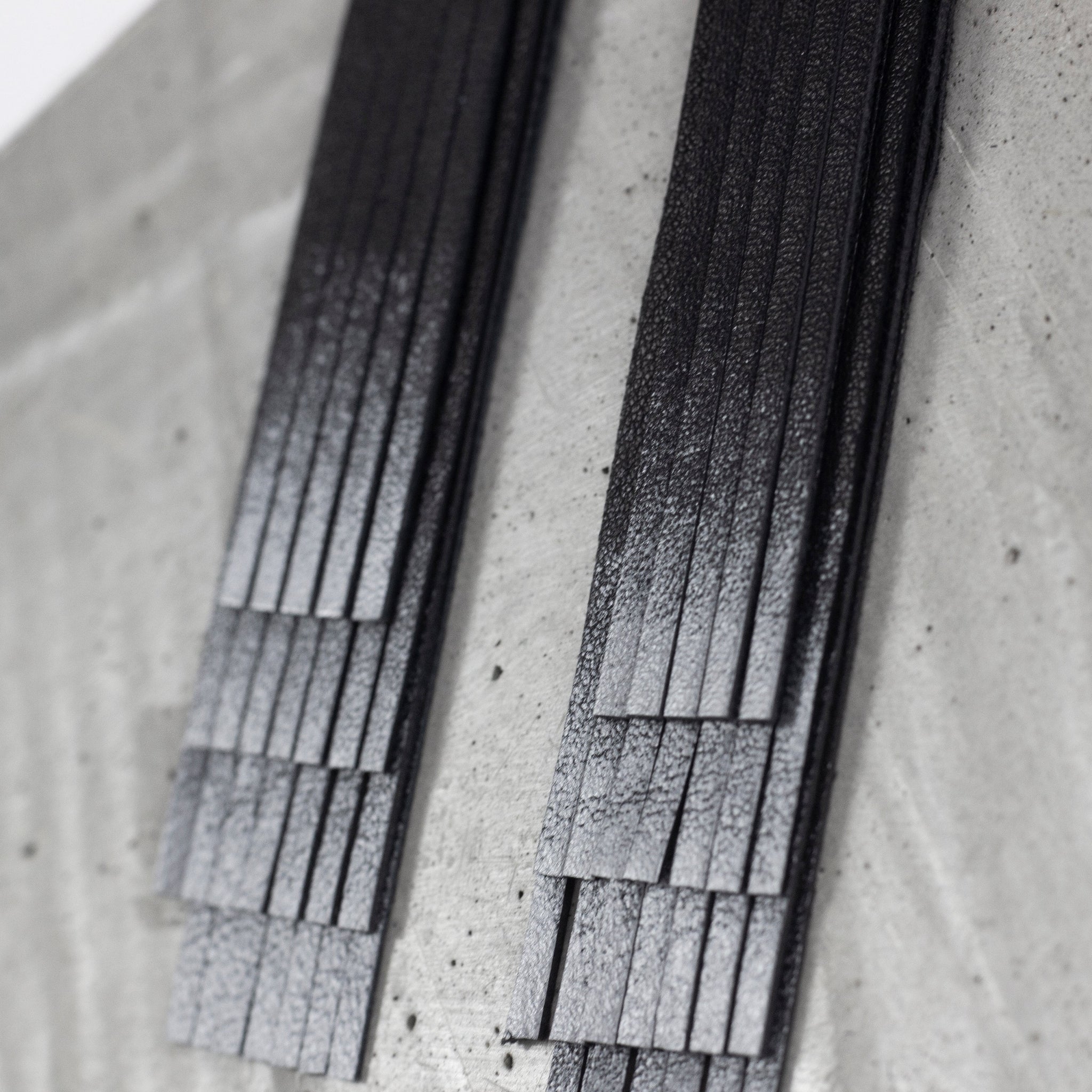 'NOBU' Black and Silver Leather Fringe Earrings
