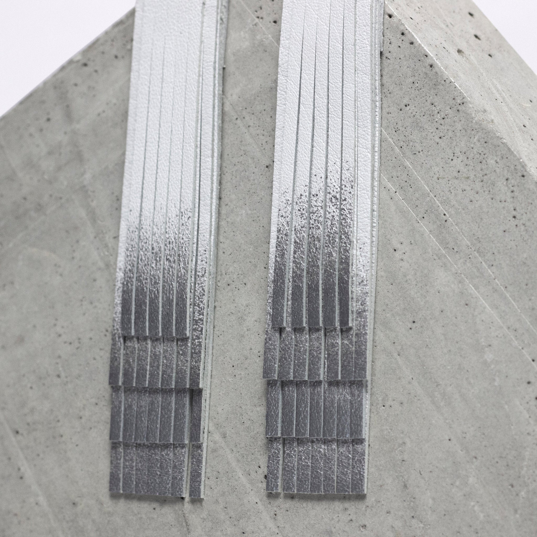'NOBU' White and Silver Leather Fringe Earrings