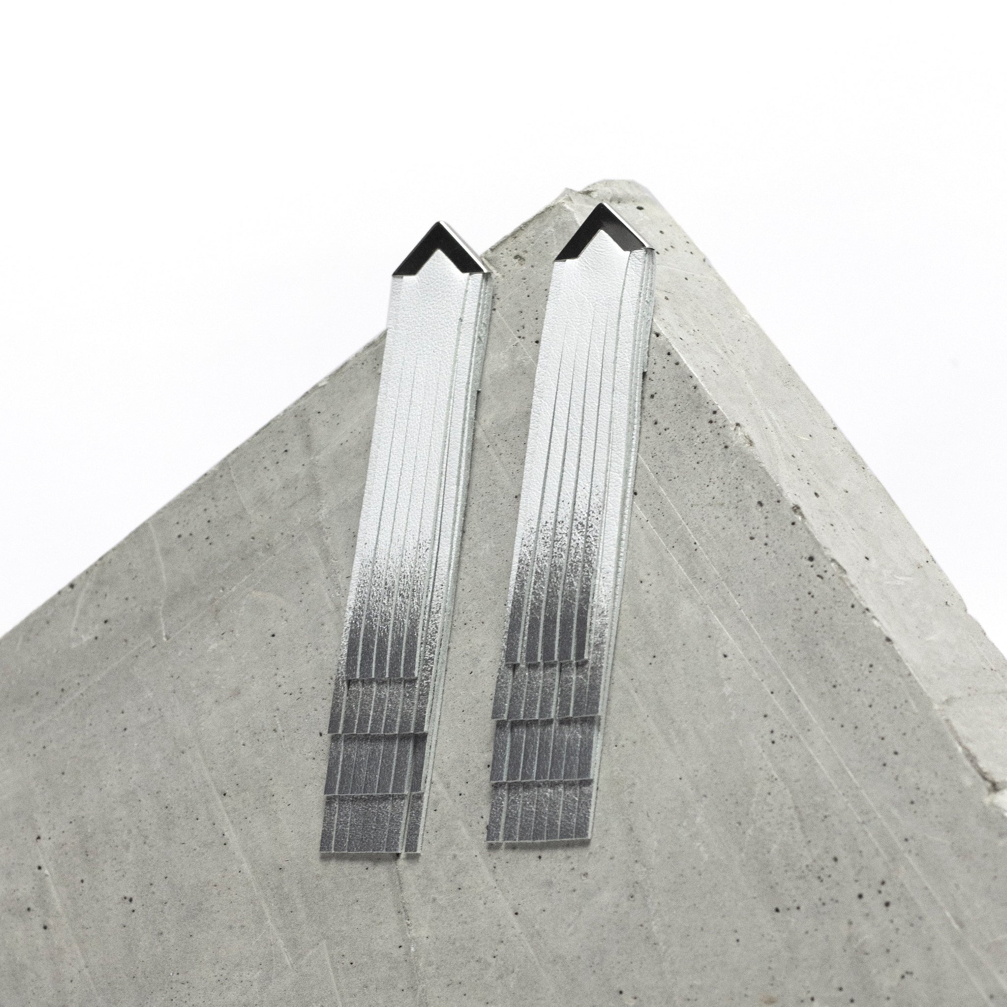 'NOBU' White and Silver Leather Fringe Earrings