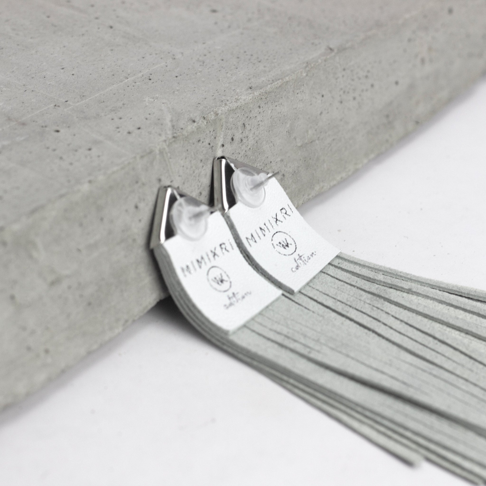 'NOBU' White and Silver Leather Fringe Earrings