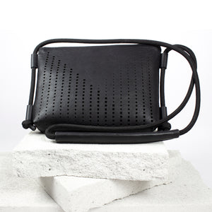 Black leather laser cut clutch