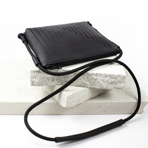 Black leather laser cut clutch