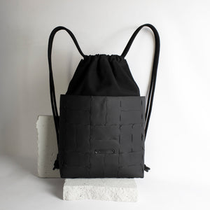 Recycled leather and canvas drawstring backpack