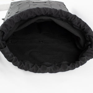 Recycled leather and canvas drawstring backpack